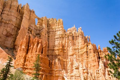 Large hoodoos and The Cathedral Butte along Peak-A-Boo Trail in Bryce Canyon National Park