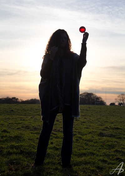 Contact juggling at sunset in Phoenix Park, Dublin, Ireland