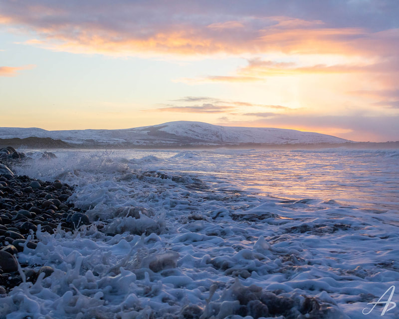 Sunset, Snow, and waves in Strandhill, County Sligo