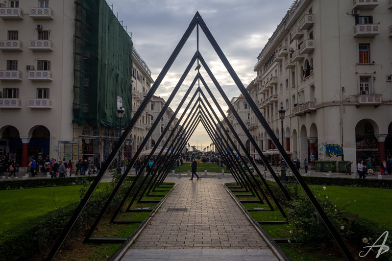 A view through a pyramidal art sculpture in Thessaloniki, Greece.